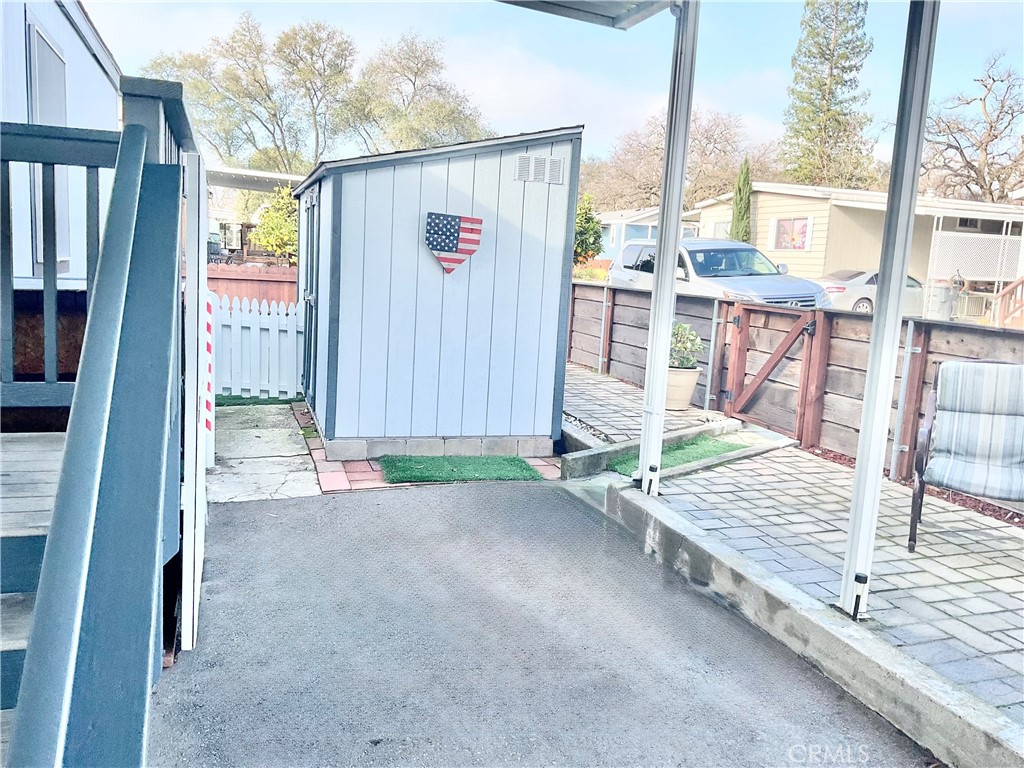 6154 South Walnut Street, Unit 40 Loomis, CA 95650 - Photo 11 of 15 a view of backyard with cabin