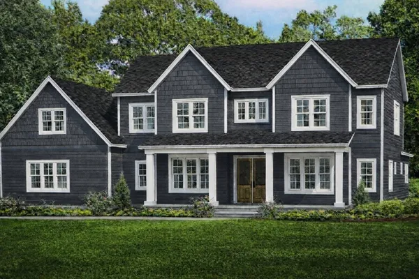 front view of a house with a yard