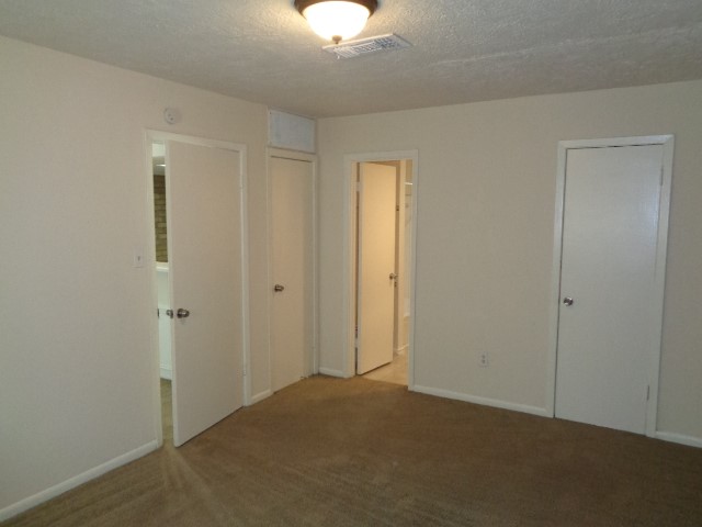701 Foster Drive, Unit 4 Conroe, TX 77301 - Photo 8 of 11 a view of an empty room