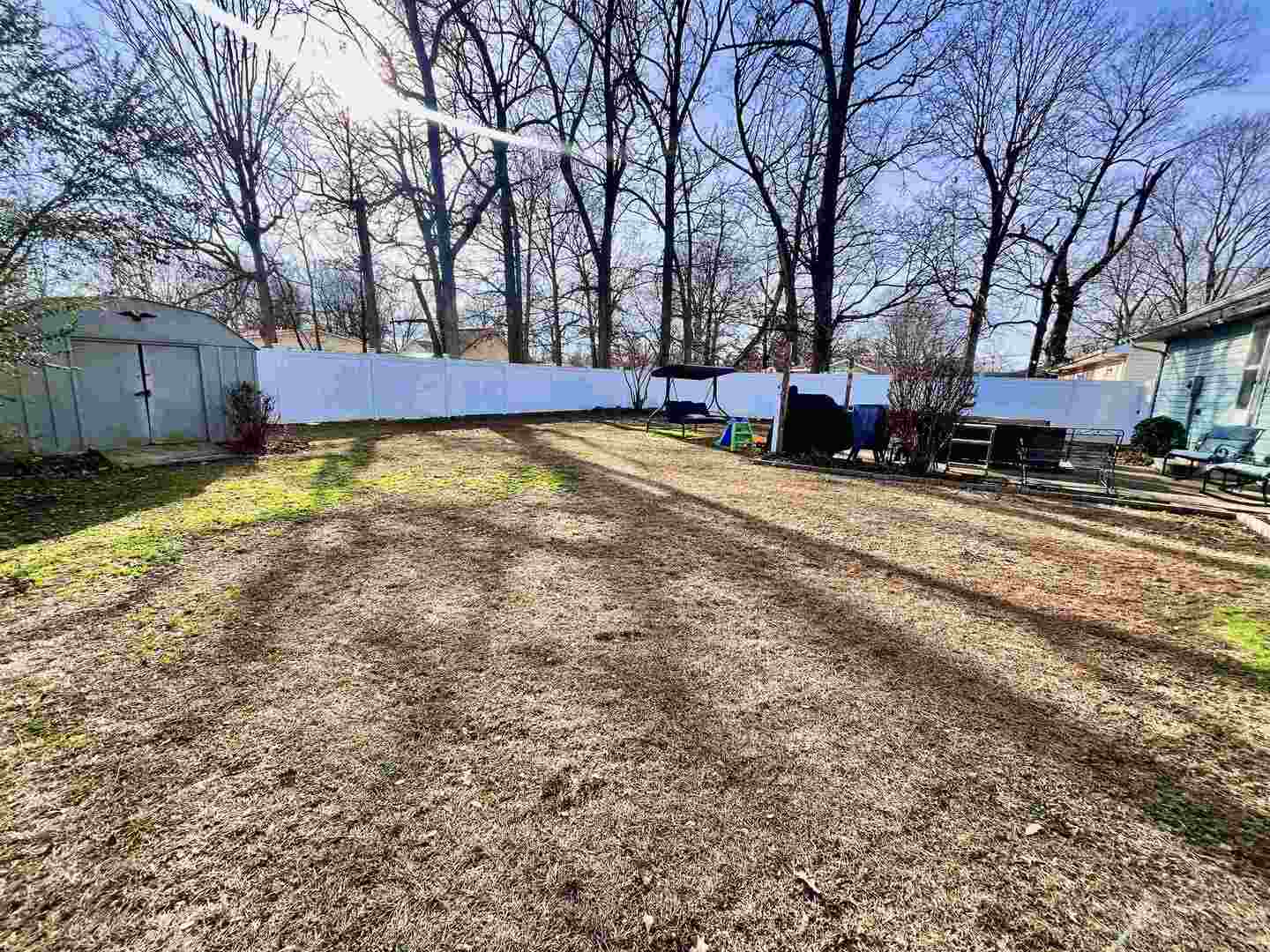 212 East 19th Street Metropolis, IL 62960 - Photo 9 of 30 a view of a yard with a large tree