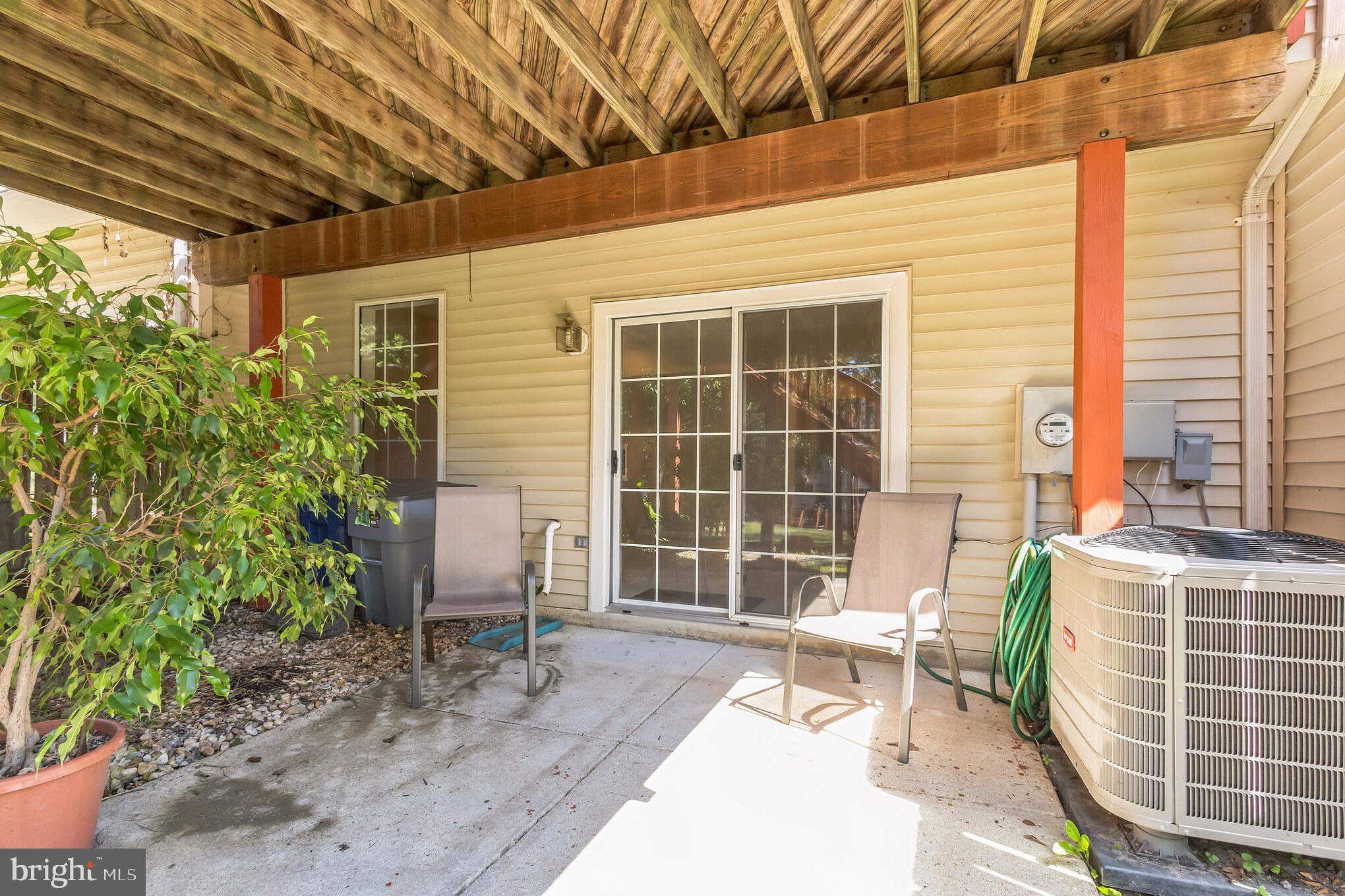 14110 Parker Farm Way Silver Spring, MD 20906 - Photo 28 of 30 Patio under deck leads to the recreation room