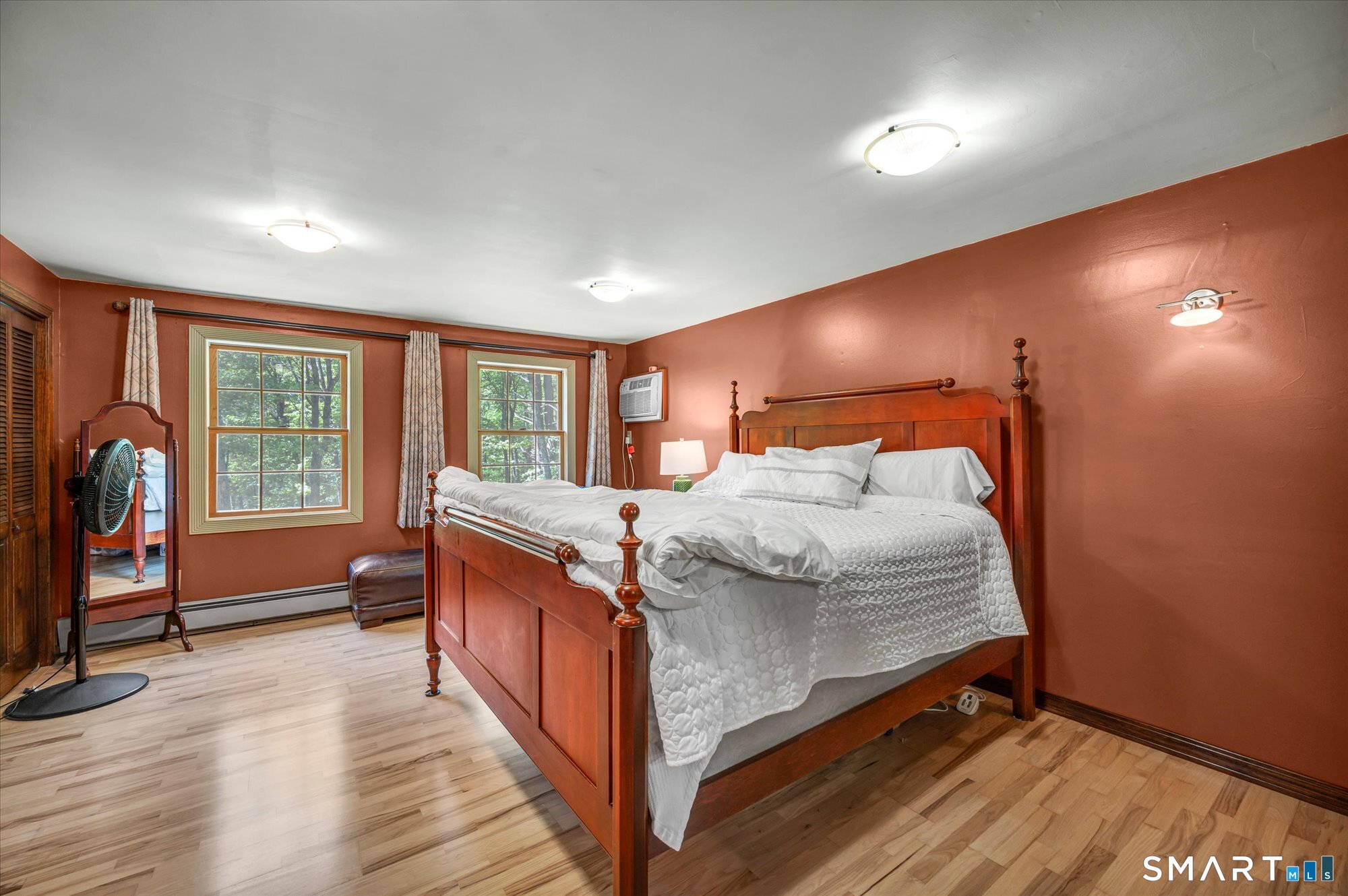 59 Indian Hill Road Canton, CT 06019 - Photo 24 of 39 a bed room with a bed and a large window