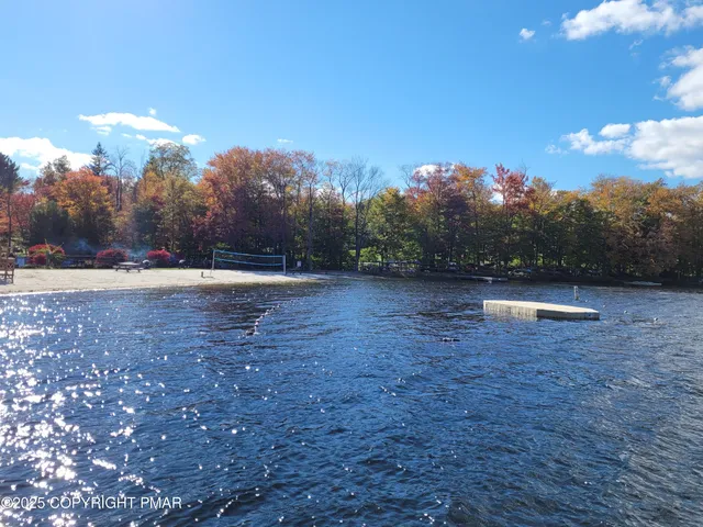 a view of a yard with a trampoline