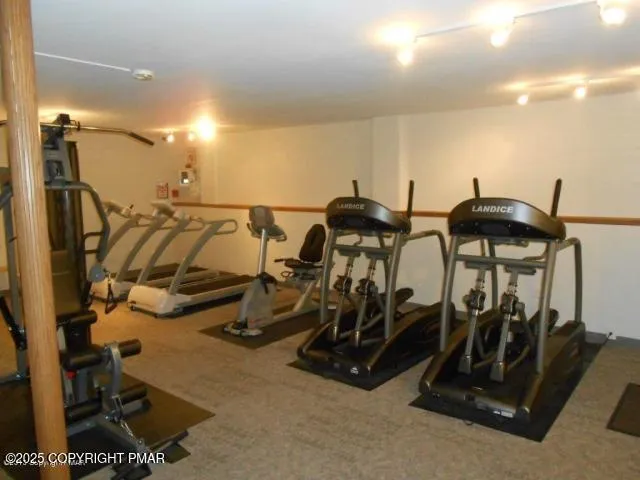a view of a room with gym equipment
