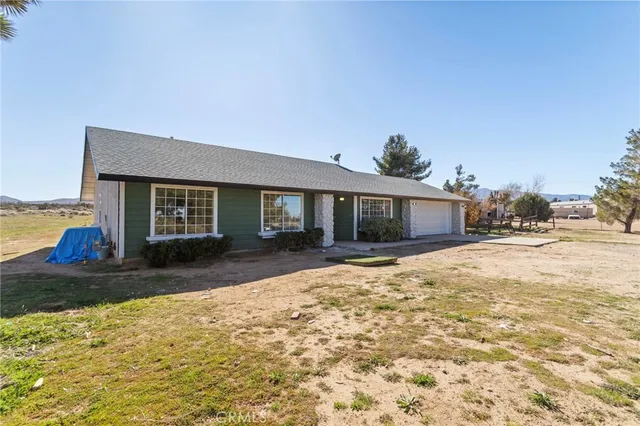 a house view with a outdoor space