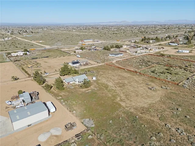 an aerial view of a house with a outdoor space