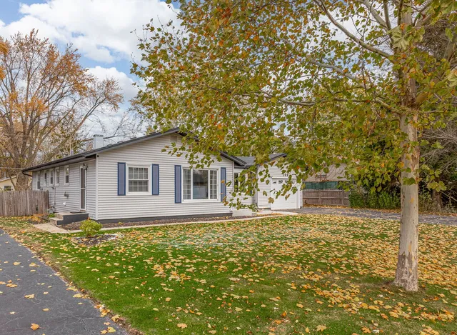 a house with trees in the background