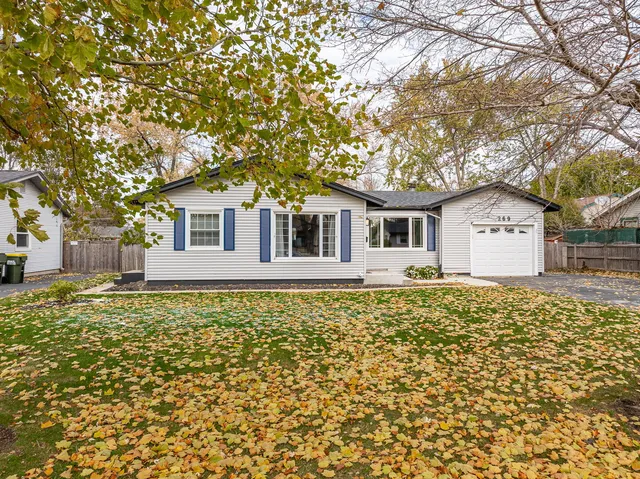 a house with trees in the background