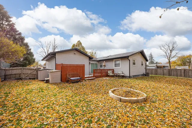 an aerial view of residential house with a yard