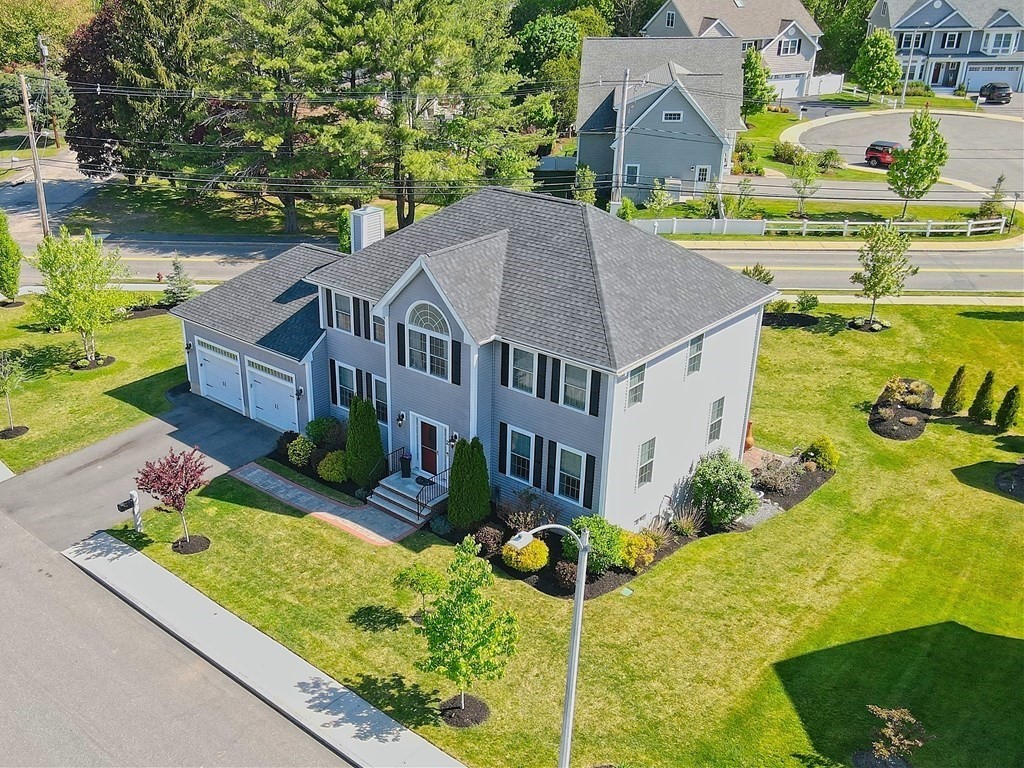 a aerial view of a house with garden