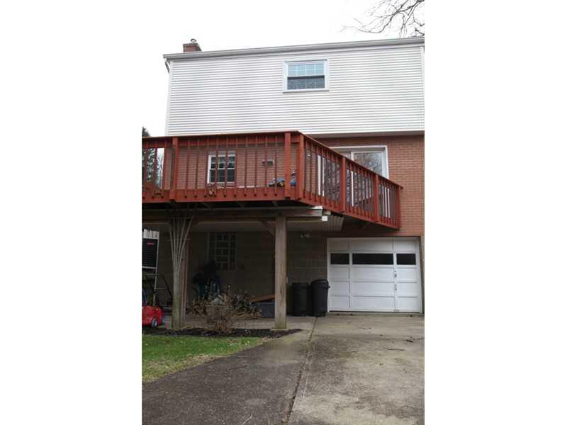 113 Deimling Road Pittsburgh, PA 15229 - Photo 12 of 16 Land/Lot. Cement Driveway & a Covered Patio with a Rain Diverting System that sheds water away from the patio surface.