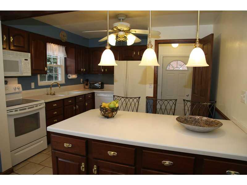 113 Deimling Road Pittsburgh, PA 15229 - Photo 4 of 16 Kitchen. Plenty of Corian Counter Space - Cherry Cabinets too!