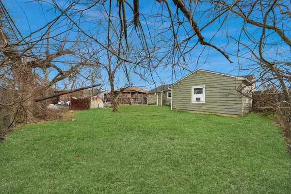 a house view with a garden space