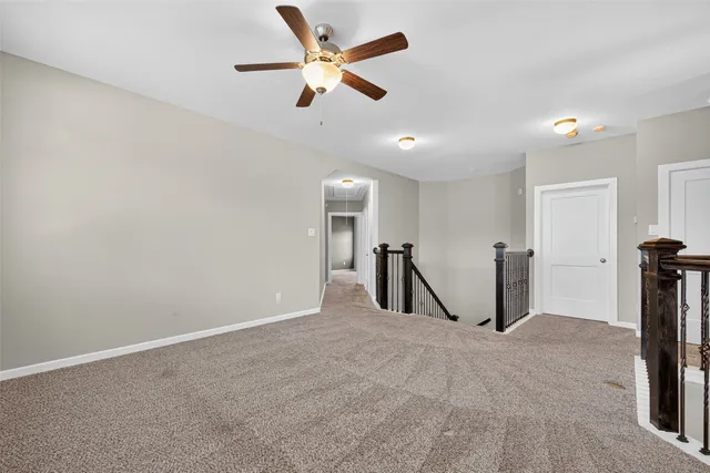 a view of a livingroom with a ceiling fan