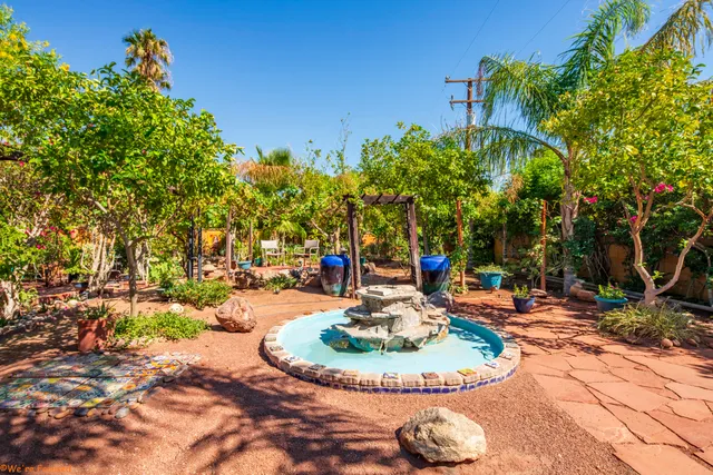 a view of a yard in front of house with a yard