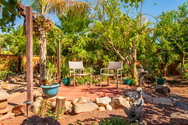 a backyard of a house with lots of green space