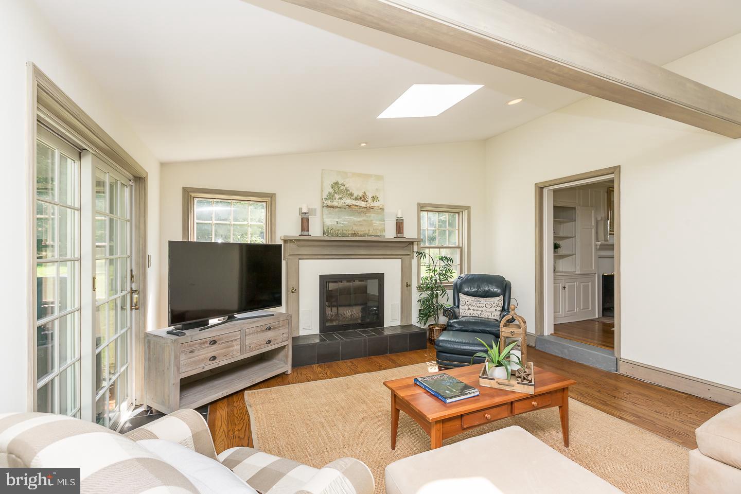 1287 Argyle Road Berwyn, PA 19312 - Photo 13 of 56 Family room with wood burning fireplace