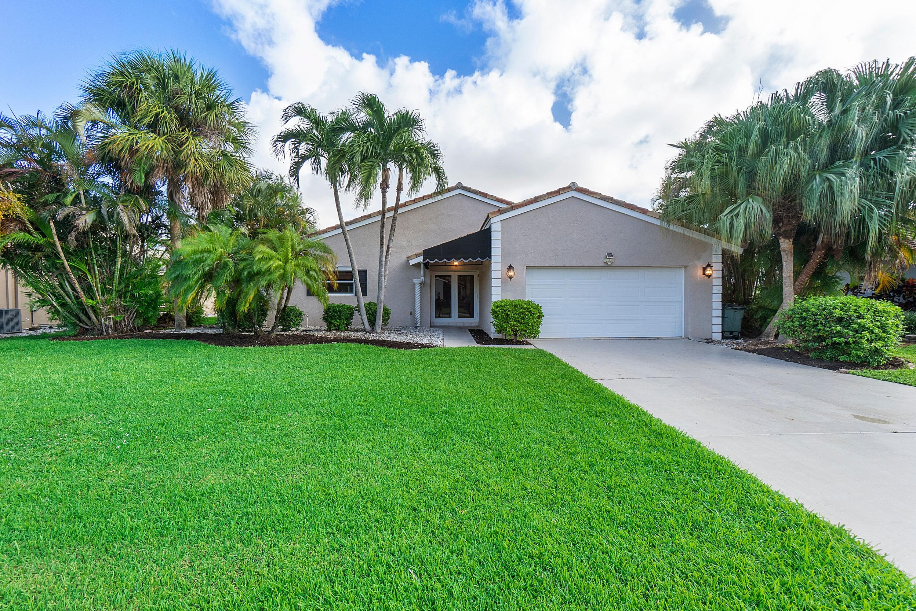 275 Northwest 69th Street Boca Raton, FL 33487 - Photo 1 of 34 boca lake front of house best 1