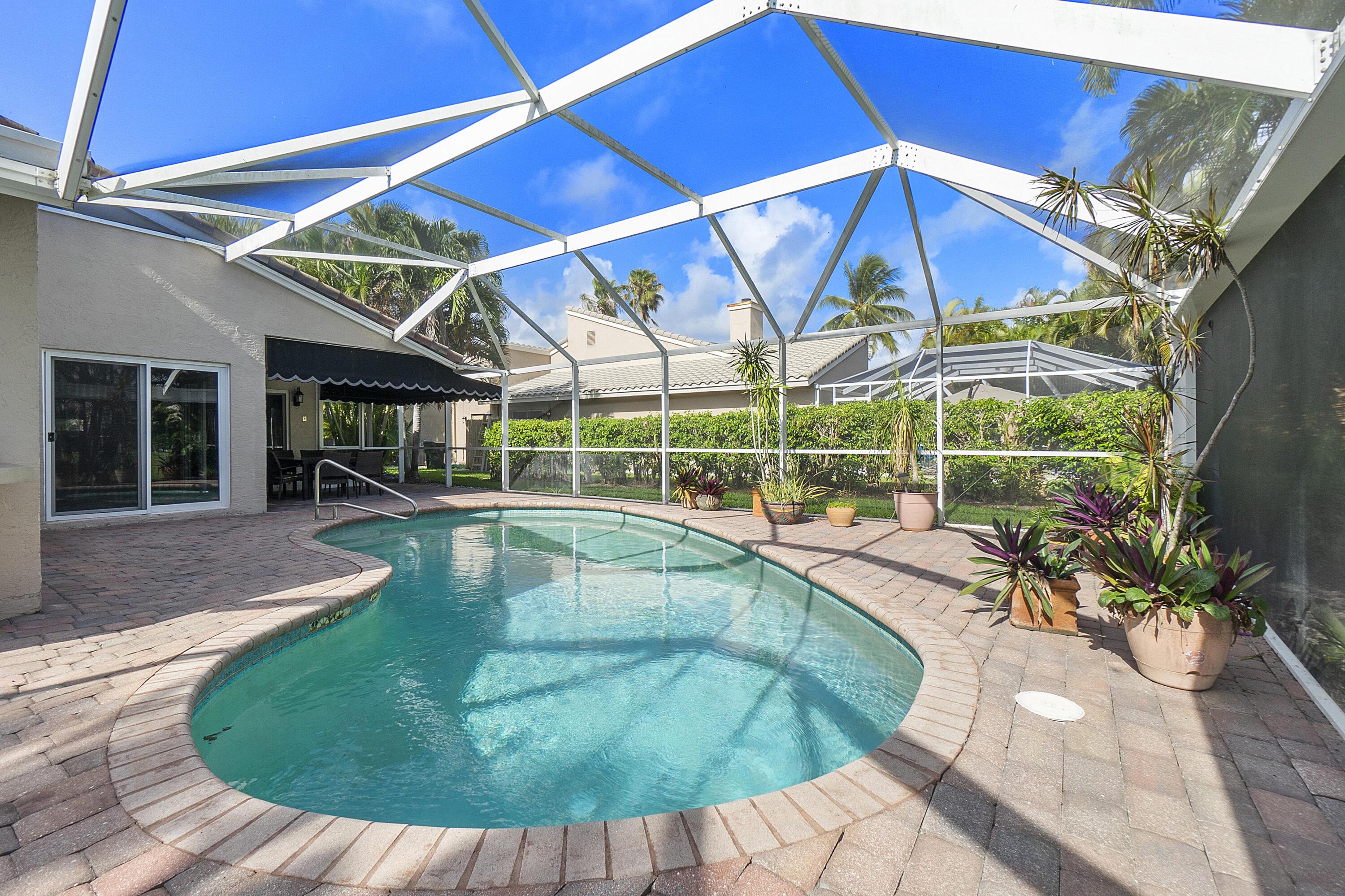 275 Northwest 69th Street Boca Raton, FL 33487 - Photo 29 of 34 BOCA LAKE POOL PATIO 5 BEST