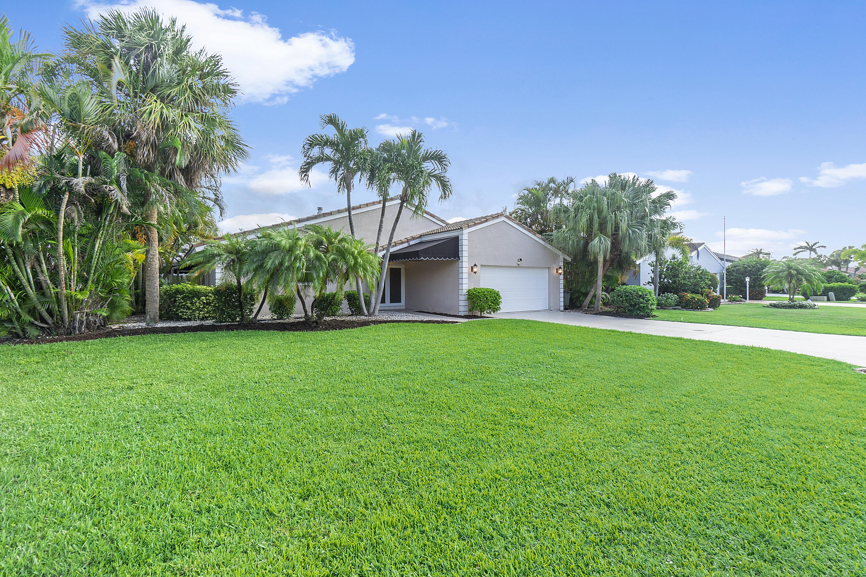 275 Northwest 69th Street Boca Raton, FL 33487 - Photo 34 of 34 boca lake side front of house
