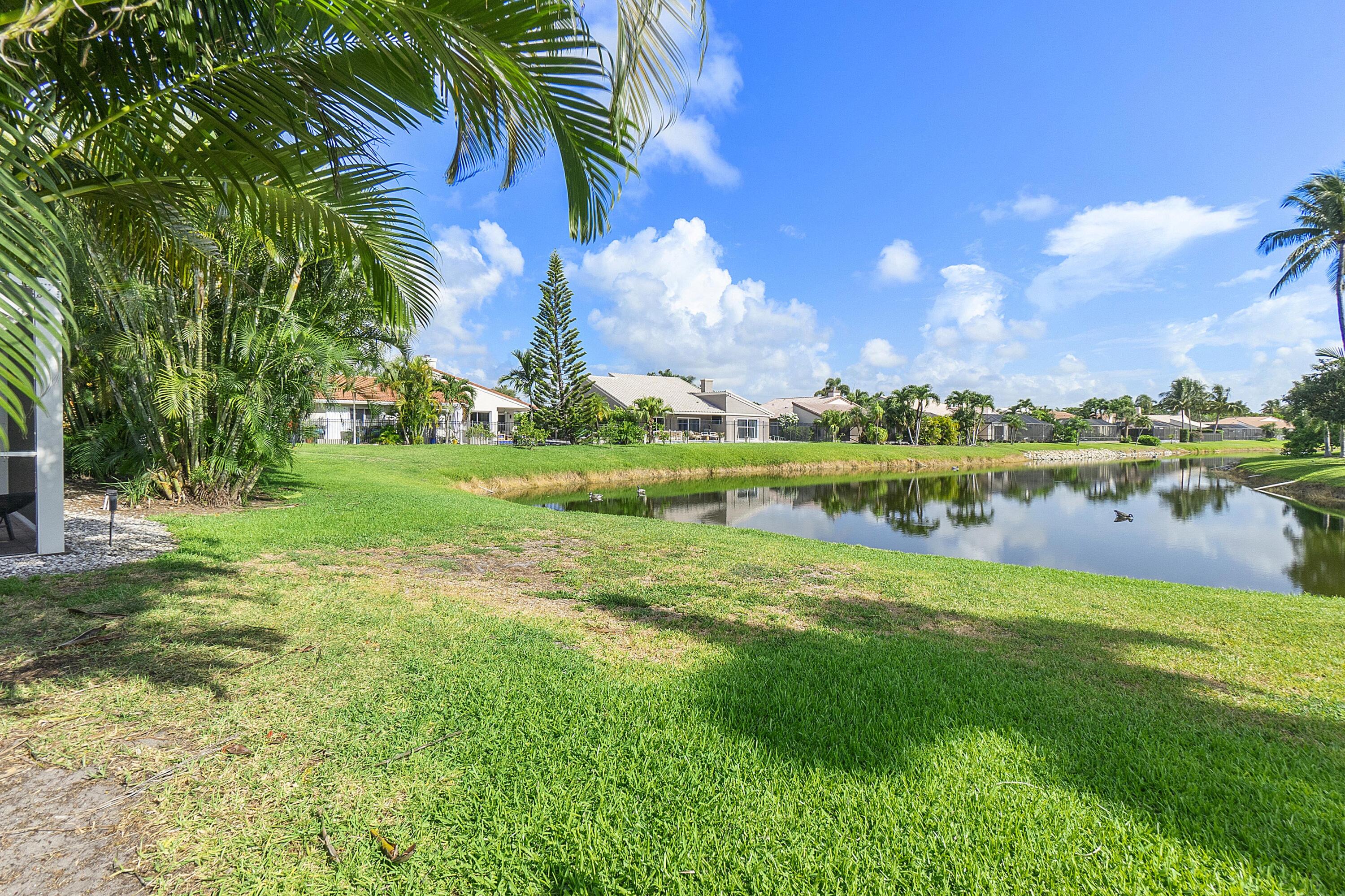 275 Northwest 69th Street Boca Raton, FL 33487 - Photo 4 of 34 BOCA LAKE YARD AND LAKE 2
