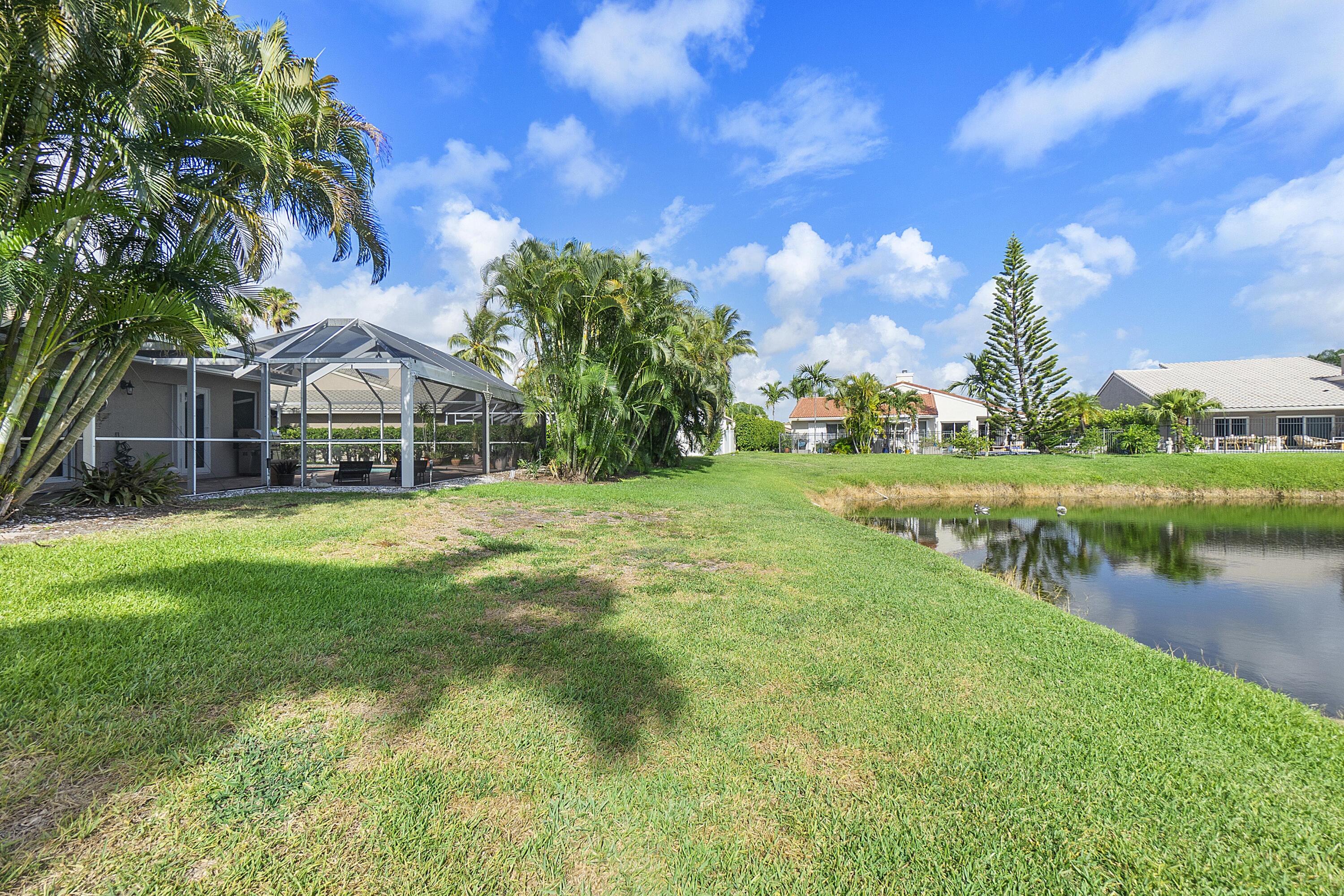 275 Northwest 69th Street Boca Raton, FL 33487 - Photo 6 of 34 BOCA LAKE YARD AREA