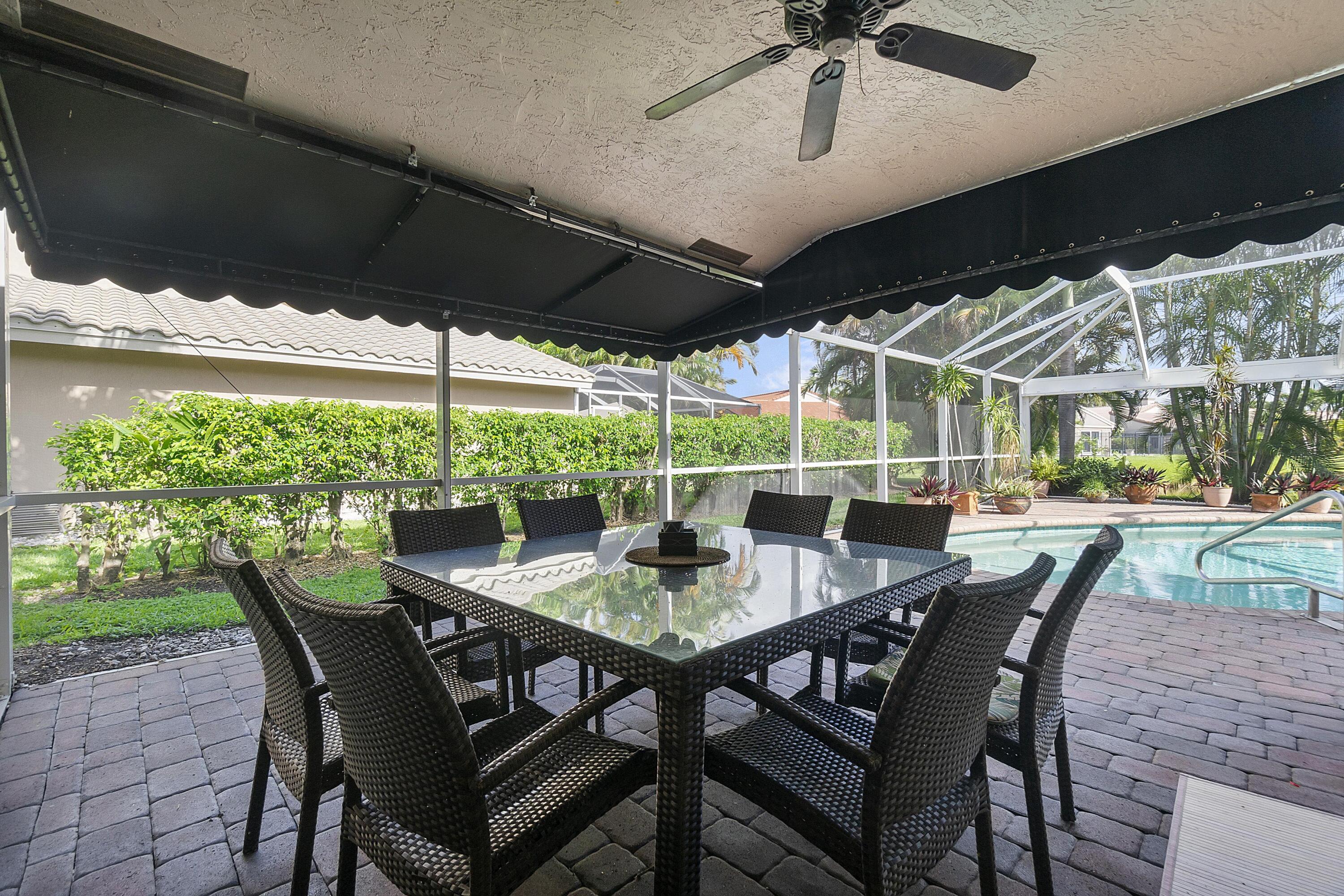 275 Northwest 69th Street Boca Raton, FL 33487 - Photo 8 of 34 BOCA LAKE OUTSIDE EAT AREA