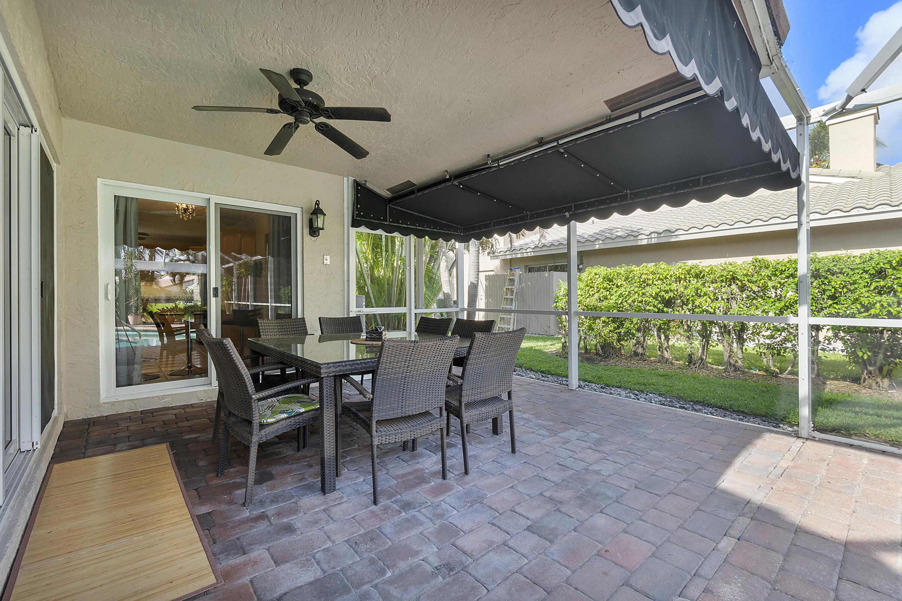275 Northwest 69th Street Boca Raton, FL 33487 - Photo 9 of 34 BOCA LAKE OUTSIDE EAT AREA 2