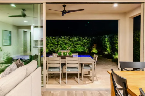 a kitchen with stainless steel appliances a sink and a refrigerator