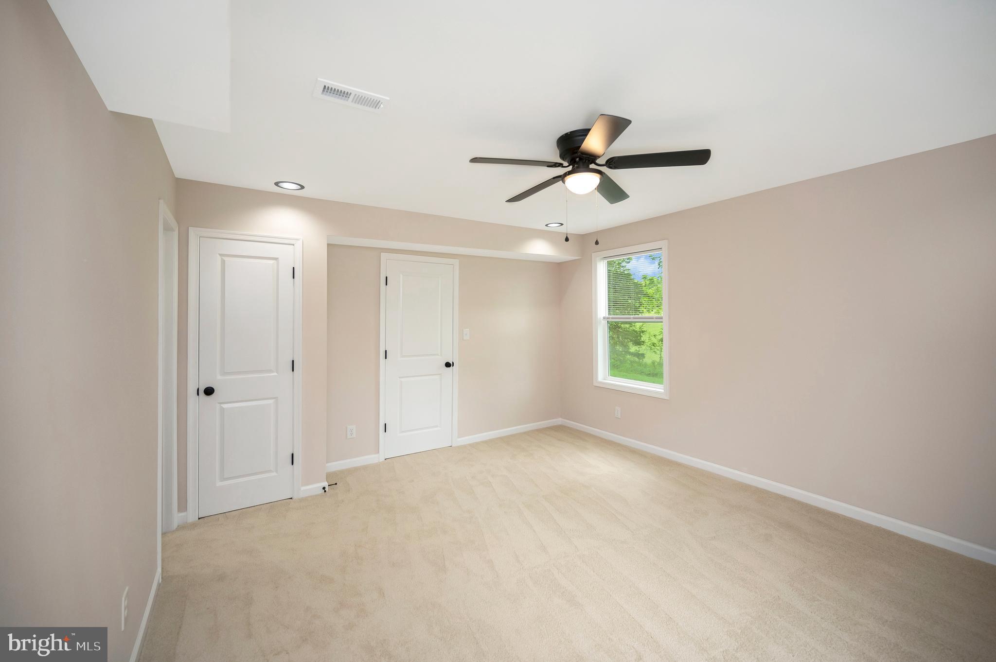 14169 Silver Hill Road Sumerduck, VA 22742 - Photo 17 of 40 a view of room with a ceiling fan and window