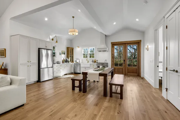 a view of a dining room with furniture window and wooden floor