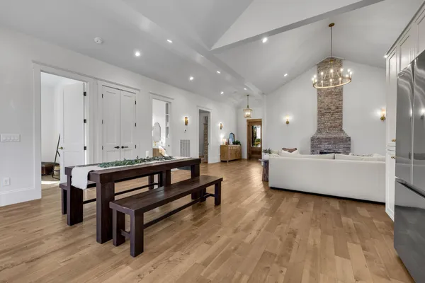 a spacious bedroom with a bed and a couch