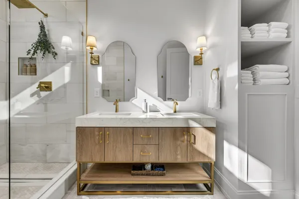 a white bath tub sitting in a bathroom