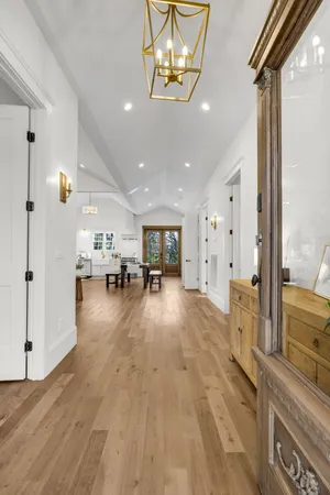 a view of a living room and a chandelier