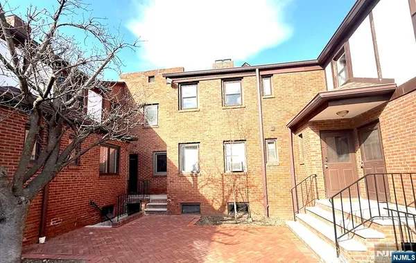 a view of house with a outdoor space