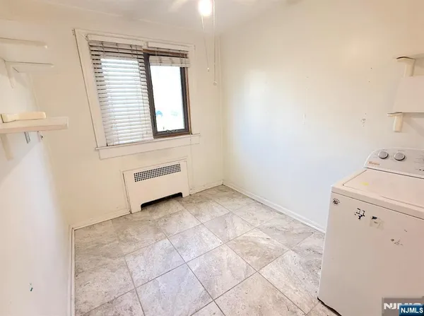a view of a kitchen with a sink