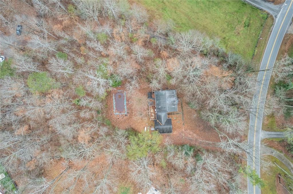 325 Ranchette Road Alpharetta, GA 30004 - Photo 18 of 25 a floor to ceiling window with tree in front of it