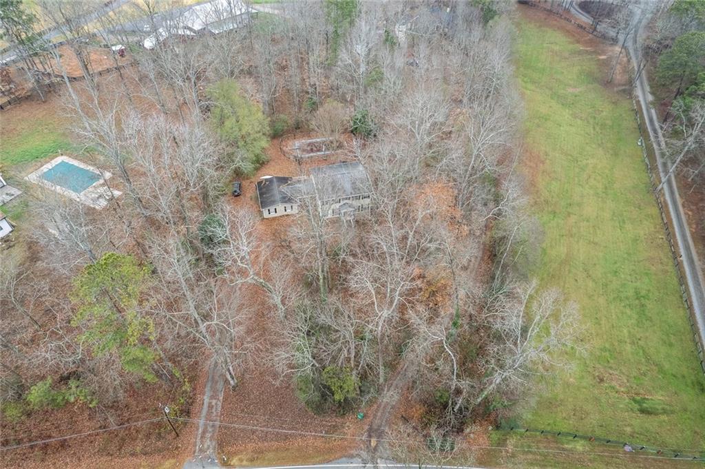 325 Ranchette Road Alpharetta, GA 30004 - Photo 20 of 25 a view of a yard with large trees