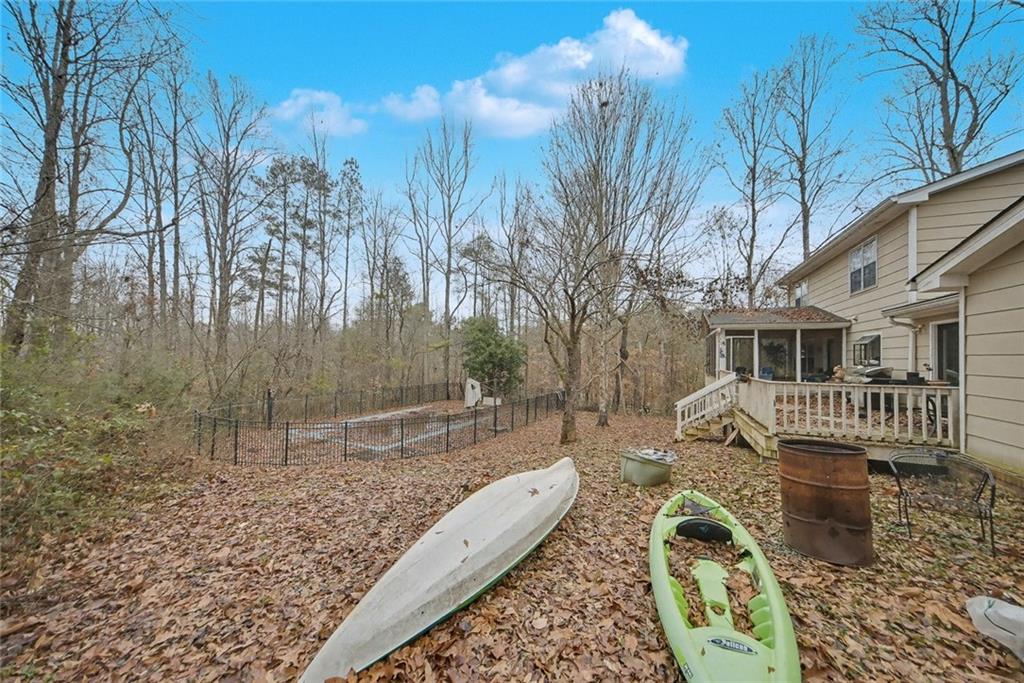 325 Ranchette Road Alpharetta, GA 30004 - Photo 5 of 25 a front view of a house with a yard