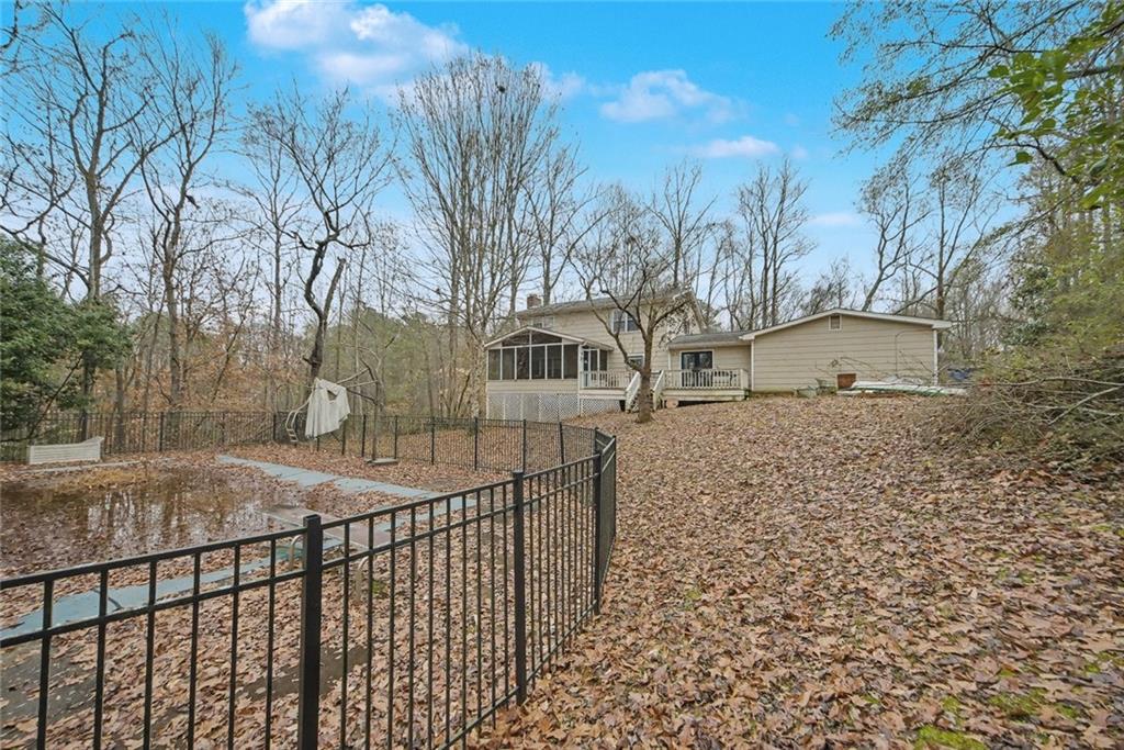 325 Ranchette Road Alpharetta, GA 30004 - Photo 7 of 25 a view of a house with a snow