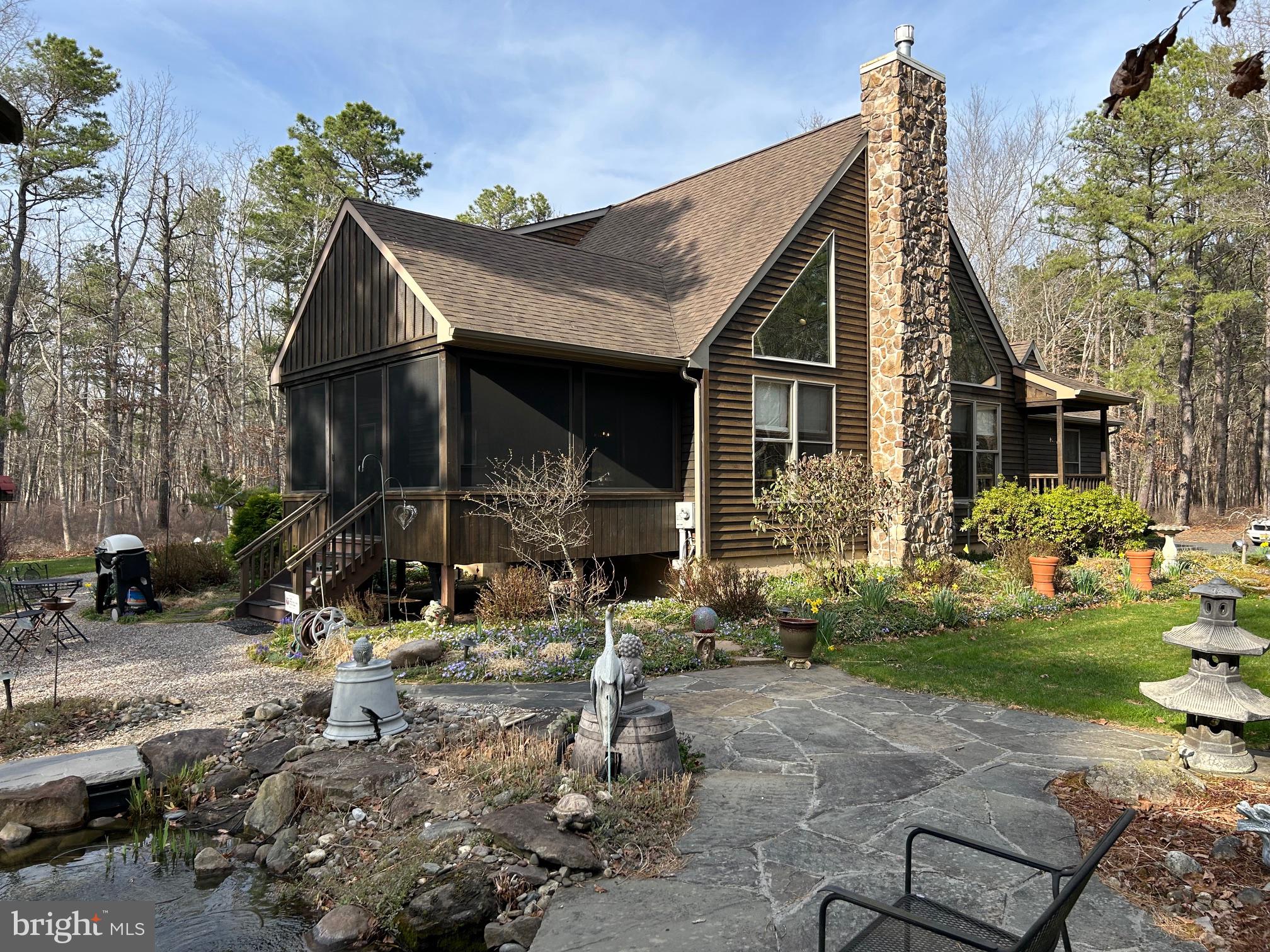 827 Weymouth Road Buena, NJ 08310 - Photo 3 of 41 Charming woodland retreat with stone accents.