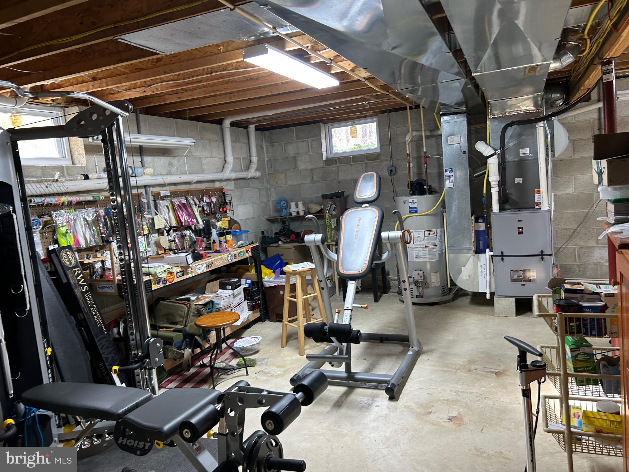 827 Weymouth Road Buena, NJ 08310 - Photo 41 of 41 Versatile basement gym and workshop space.