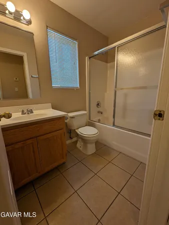 a view of a livingroom and window