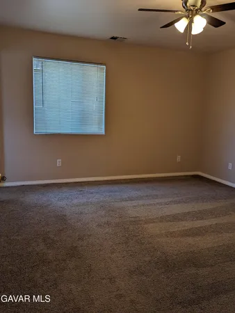 a bathroom with a sink toilet and mirror
