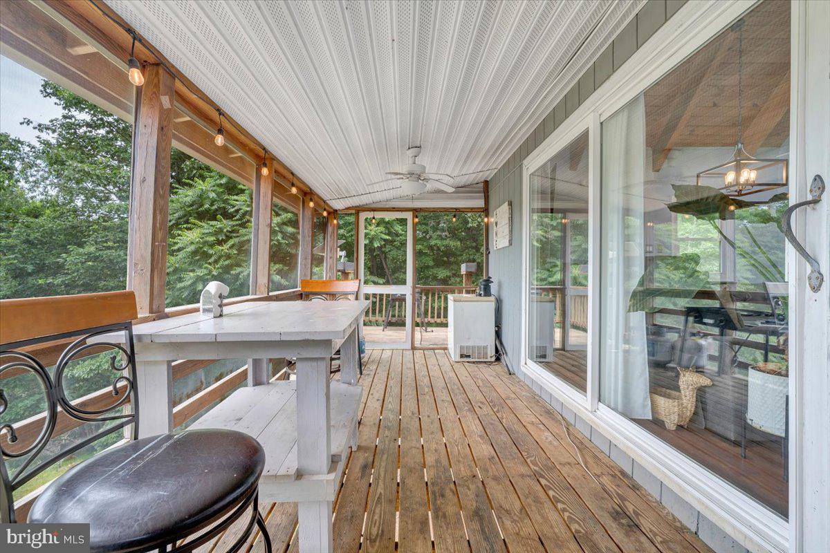 722 Foley Ridge Road Stuart, VA 24171 - Photo 30 of 67 Serene screened porch with nature views.