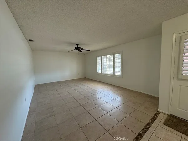 a kitchen with a sink and a stove top oven