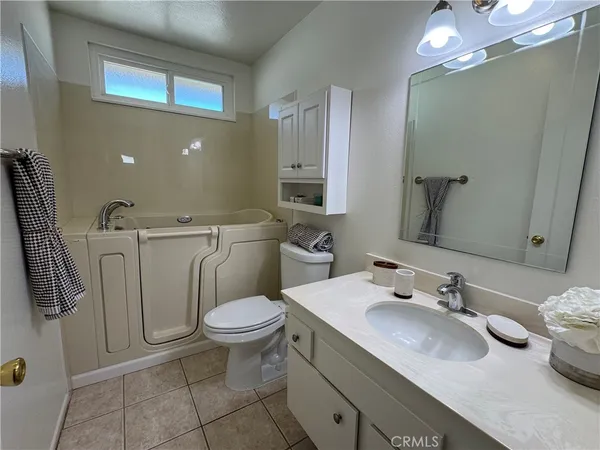 a view of an empty room with a balcony