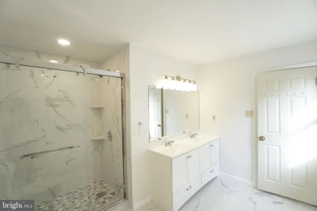 a bathroom with a shower and a toilet