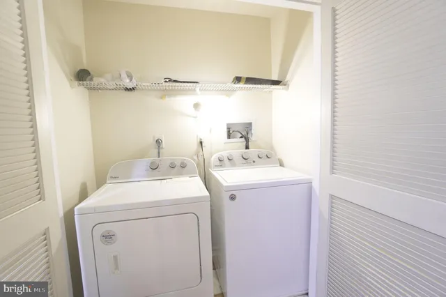 a view of a room with racks on the wall