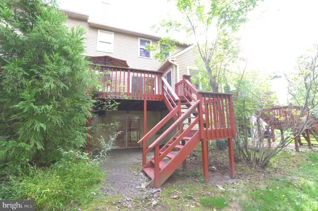 a balcony with wooden fence